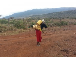 Collecting 40L of water from the school.