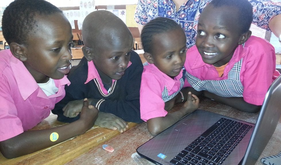 children enjoying a skype call